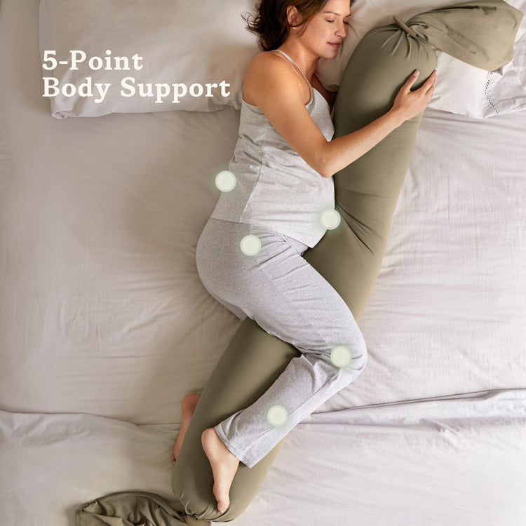 Woman using a body pillow with '5-Point Body Support' text bbhugme pregnancy pillow