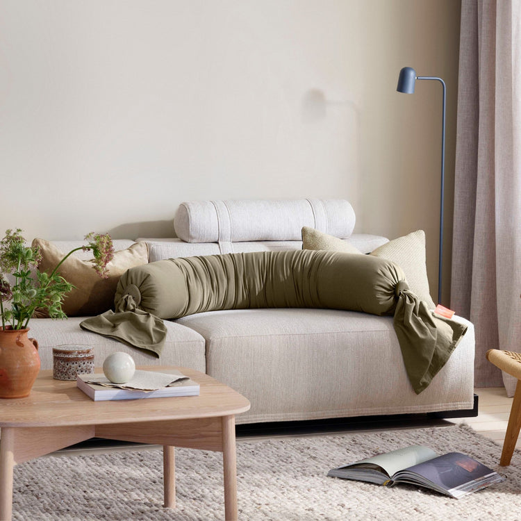 bbhugme pregnancy pillow dusty olive interior sofa